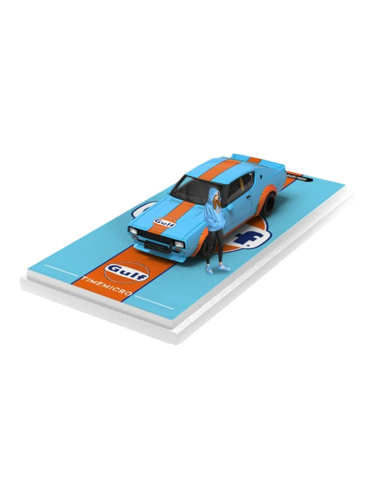 Time Micro Nissan Skyline KPGC110 Gulf Livery 1:64 Scale (With Acrylic Case and Action Figure)
