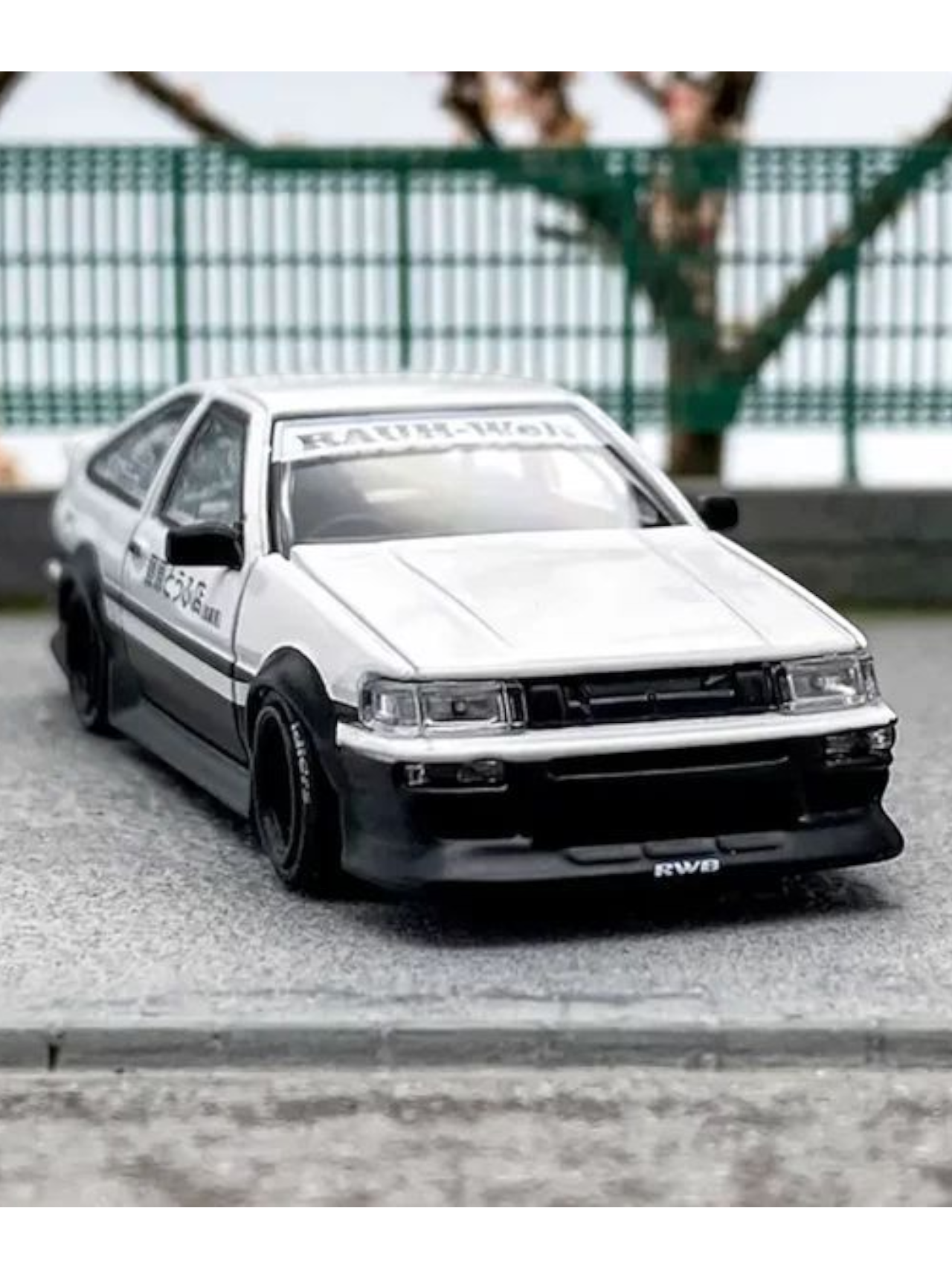 Street Warrior Toyota AE86 Rauh-Welt Premium Diecast 1:64 Scale (With Acrylic Case)
