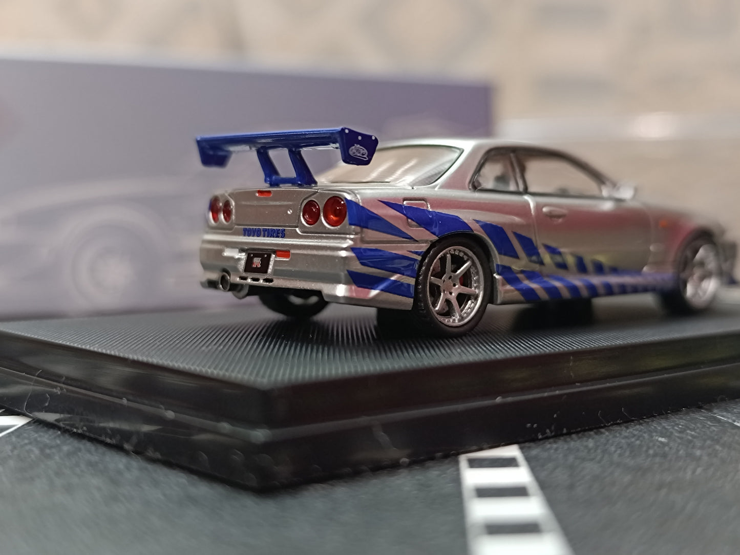 Nissan Skyline GT-R R34 C-West Imported 1:64 Scale