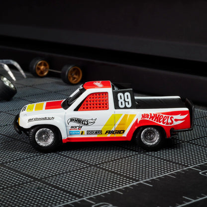 Hotwheels Elite 64 - 1989 Toyota Hilux Stadium Truck Premium Metal Die-cast Collectible 1:64 Scale (With Protector) HWR90