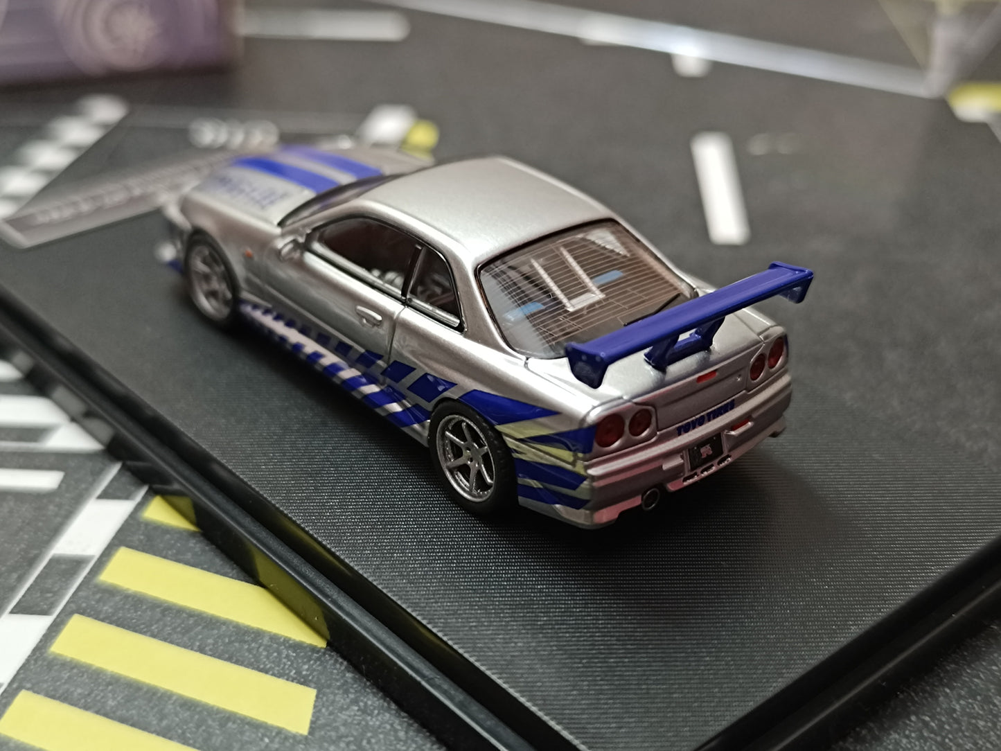 Nissan Skyline GT-R R34 C-West Imported 1:64 Scale