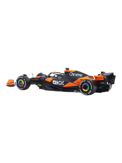 Bburago Formula 1 (F1) 2024 Mclaren MCL38 Miami Grand Prix Driver No-81 Oscar Piastri 1:24 Scale (With Figure)